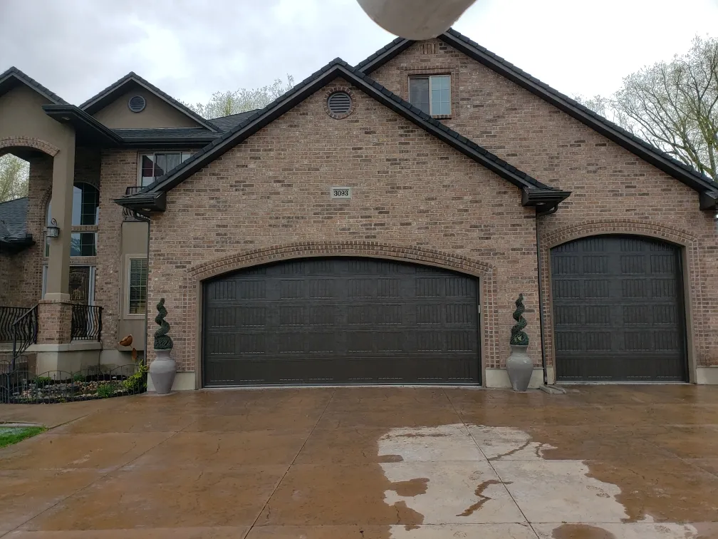 A Plus Garage Doors service fleet supporting commercial overhead door repairs