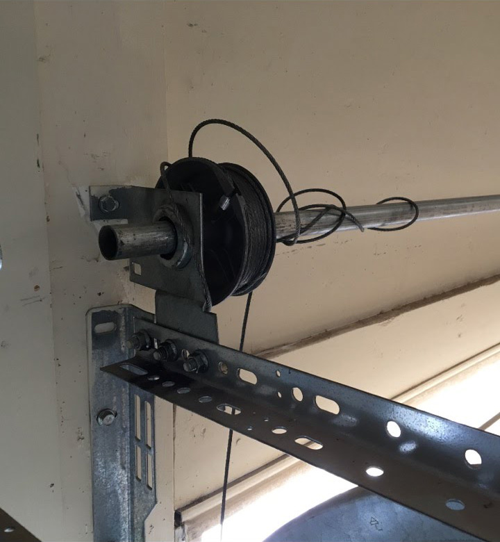 Comment réparer un câble de porte de garage cassé