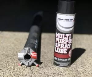 Use white lithium or silicone-based spray to lubricate, oil & maintain your garage door springs | Best garage door lubricants | A Plus Garage Doors