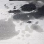 Oil Stains on Garage Concrete | Tips For Getting Oil Stains Off Your Garage Floor | A Plus Garage Doors | How to Clean Oil Off A Garage Door | How to Remove Oil Stains on Garage Floor